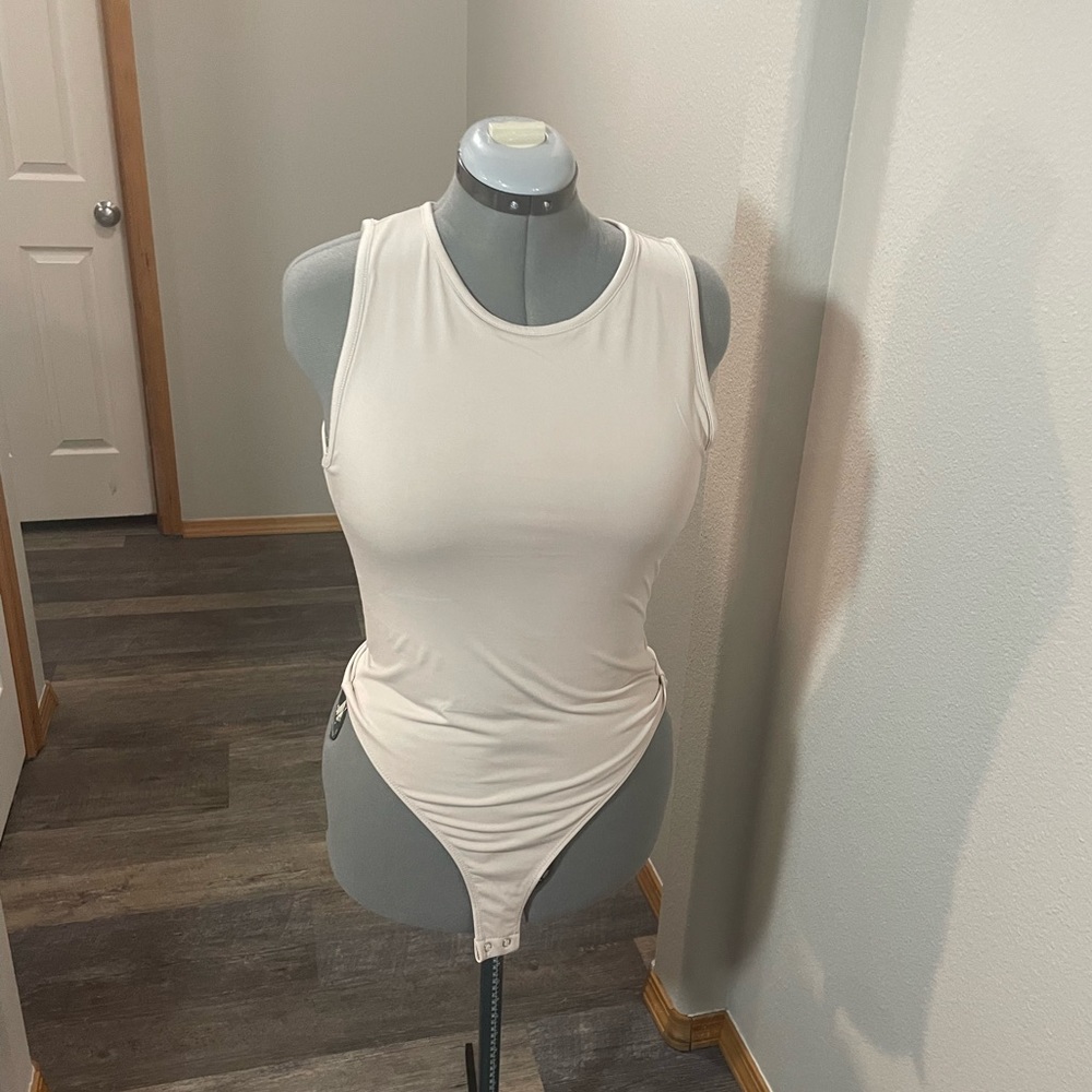 Back cutout body suit new without tags
